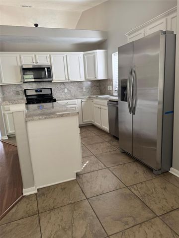 6 Tranquil Glade Place, Spring, TX 77381