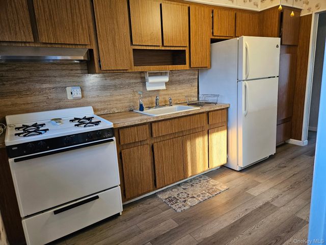 63 Voorhis Drive, Brentwood, NY 11717