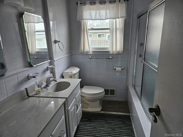 63 Voorhis Drive, Brentwood, NY 11717