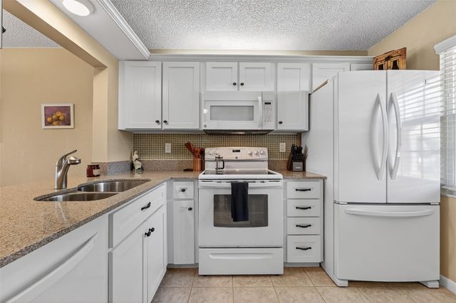 1438 MILLSTREAM LANE 105, Dunedin, FL 34698