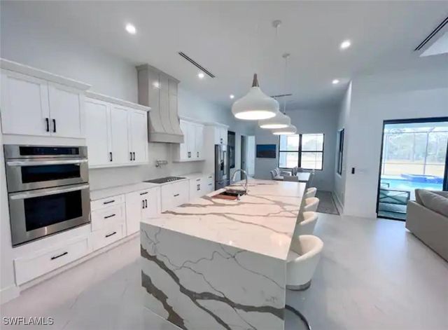 687 23rd ST SW, Naples, FL 34117