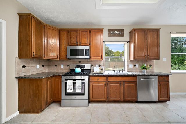 2402 Great Oaks Drive, Missouri City, TX 77459