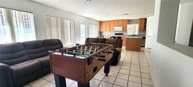 1212 SANDBROOK DRIVE, Orlando, FL 32824