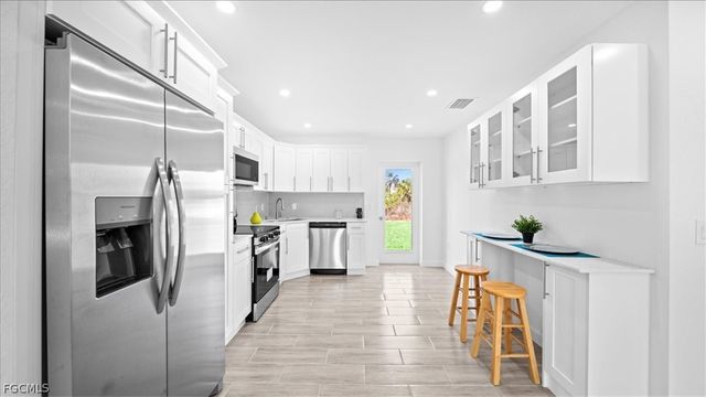 906 Capetown AVE, Lehigh Acres, FL 33974