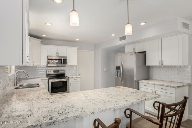 10414 E FLINTLOCK Drive, Sun Lakes, AZ 85248