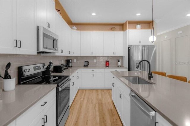 9039 PLAY THROUGH DRIVE, Davenport, FL 33896