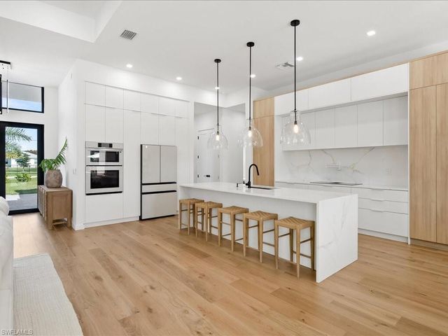 424 Shady Hollow BLVD W, Naples, FL 34120