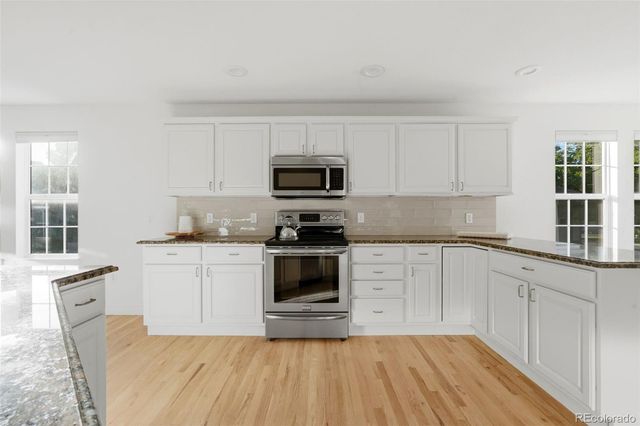 7883 S Buchanan Way, Aurora, CO 80016