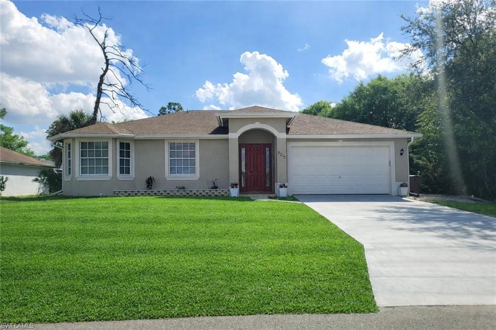3217 50th ST W, LEHIGH ACRES, FL 33971 — exterior