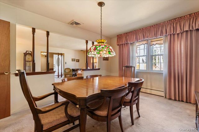 22 Woodmont Road, Melville, NY 11747