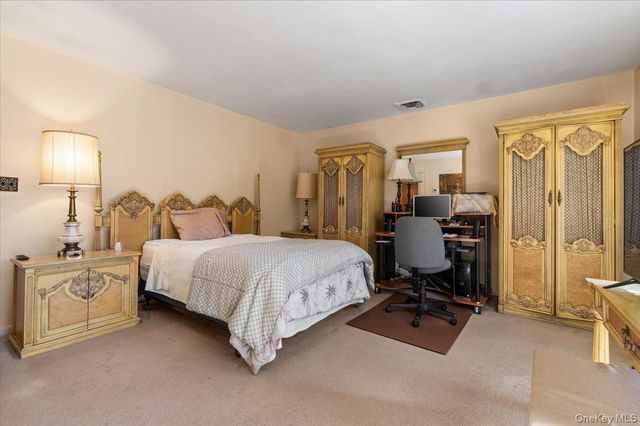 22 Woodmont Road, Melville, NY 11747