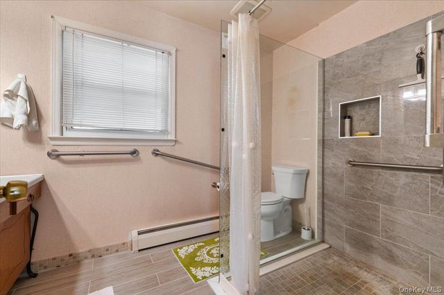 22 Woodmont Road, Melville, NY 11747