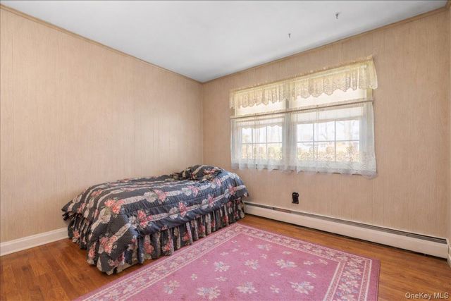 22 Woodmont Road, Melville, NY 11747