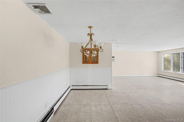 18 Woodbrook Drive, Ridge, NY 11961