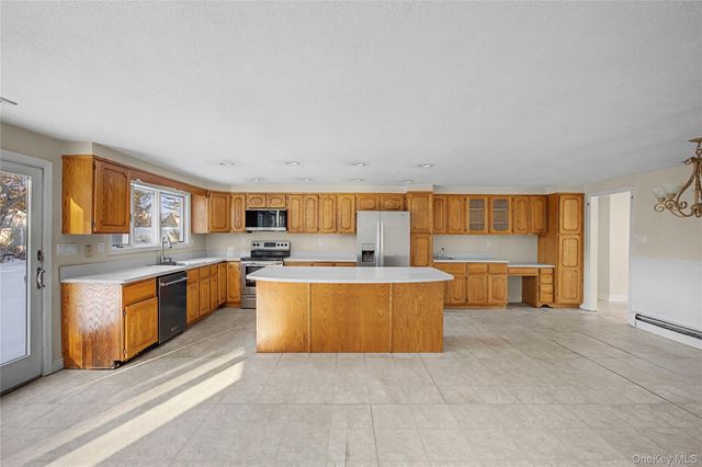 18 Woodbrook Drive, Ridge, NY 11961