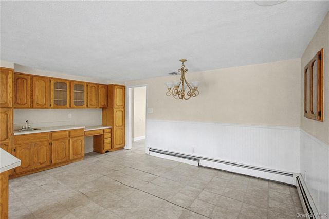 18 Woodbrook Drive, Ridge, NY 11961