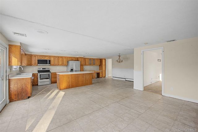 18 Woodbrook Drive, Ridge, NY 11961