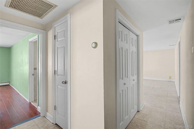 18 Woodbrook Drive, Ridge, NY 11961