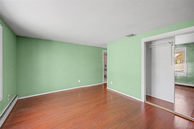 18 Woodbrook Drive, Ridge, NY 11961