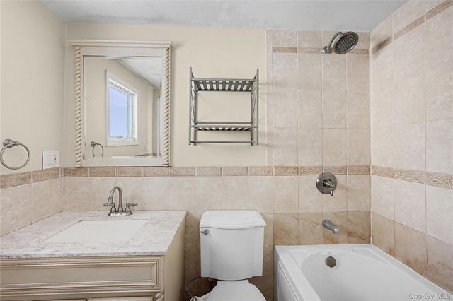 18 Woodbrook Drive, Ridge, NY 11961