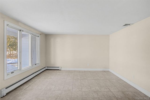 18 Woodbrook Drive, Ridge, NY 11961