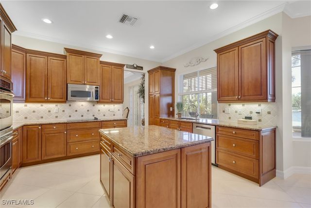 1859 Ivory Cane PT, Naples, FL 34119