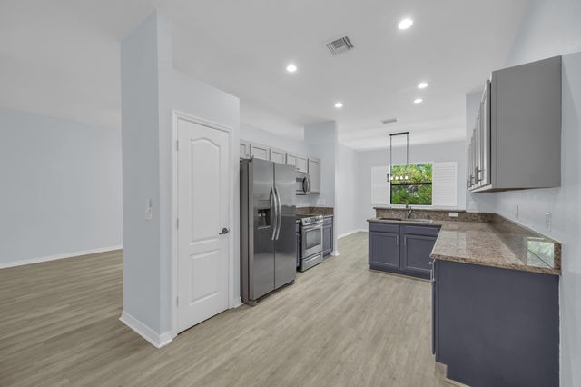 6631 SE Woodmill Pond Lane, Stuart, FL 34997