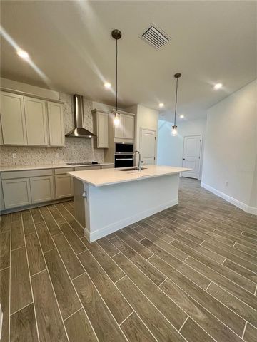 2299 JUNIPER BERRY AVENUE, Minneola, FL 34715