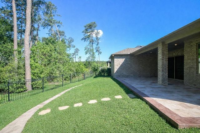 604 Castlewood Cove Lane, Pinehurst, TX 77362