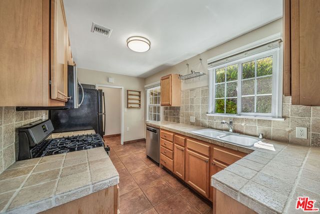 15031 15033 Hartland Street, Van Nuys, CA 91405