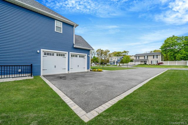 60 Parsnip Pond Road, Lake Grove, NY 11755