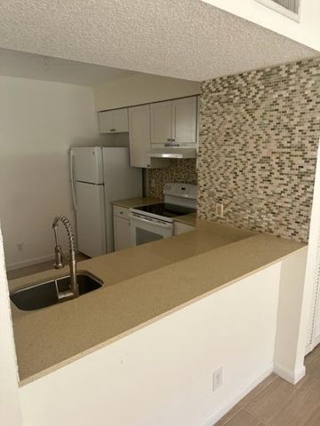 1110 Lake Shore Drive 103, Lake Park, FL 33403