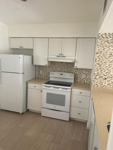 1110 Lake Shore Drive 103, Lake Park, FL 33403