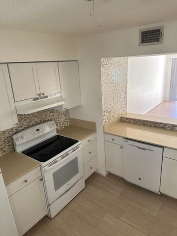 1110 Lake Shore Drive 103, Lake Park, FL 33403