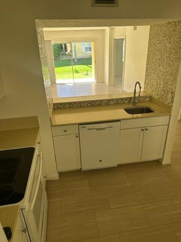 1110 Lake Shore Drive 103, Lake Park, FL 33403