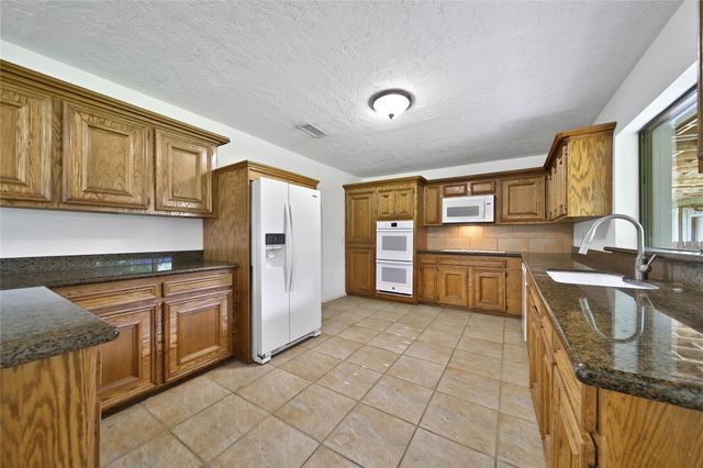 15418 Willis Way, Conroe, TX 77384