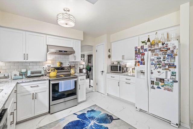 11145 N Riverland COURT, Mequon, WI 53092
