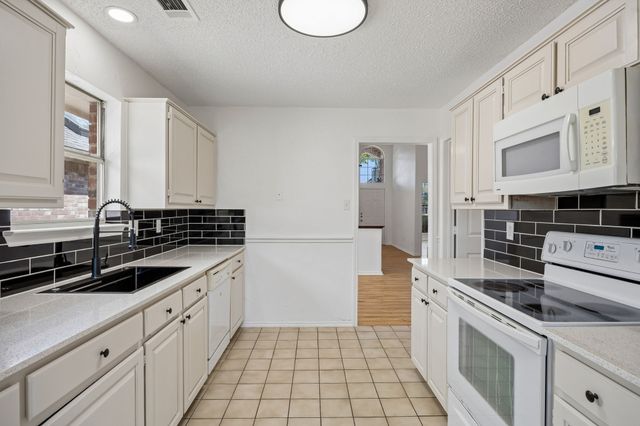 537 Raintree Circle, Coppell, TX 75019