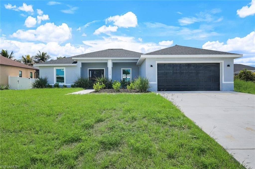 1409 NE 18th PL, CAPE CORAL, FL 33909 — exterior