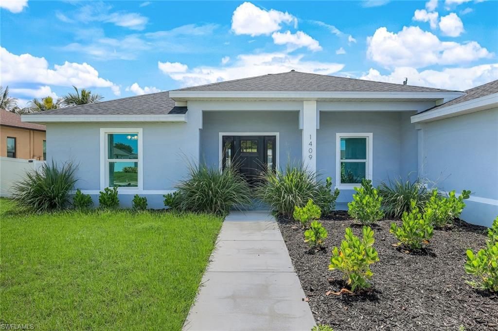 1409 NE 18th PL, CAPE CORAL, FL 33909 — photo 2