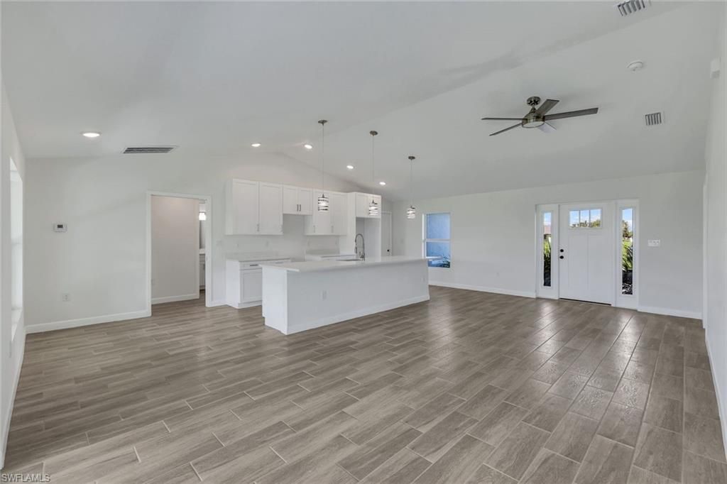 1409 NE 18th PL, CAPE CORAL, FL 33909 — photo 4
