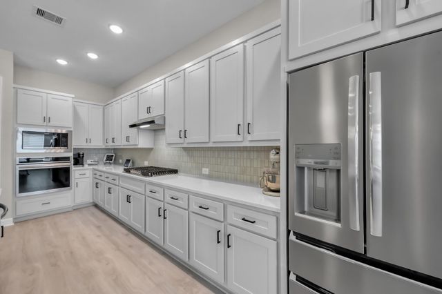 231 Painters Ridge Court, Willis, TX 77318