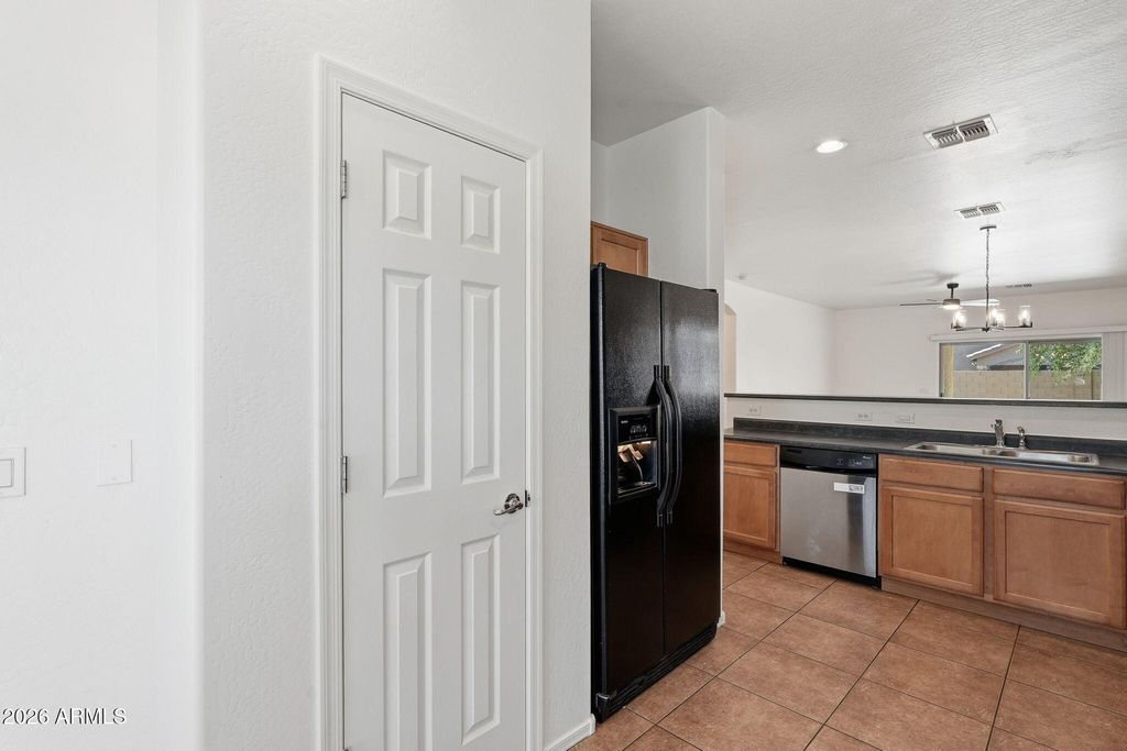 Image 9 of property listing at 10235 W LUXTON Lane, Tolleson, AZ 85353