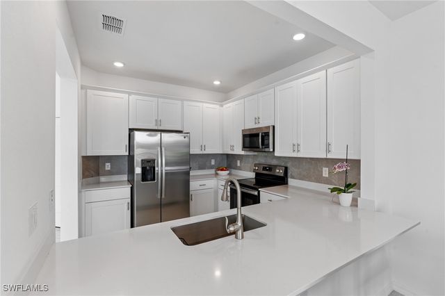 2850 Blossom WAY, Naples, FL 34120