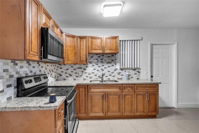 1064 NW 103rd St, Miami, FL 33150