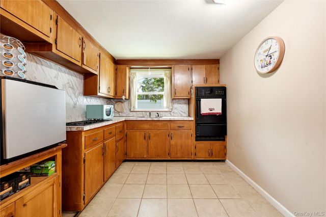 29 Suffolk Road A, Massapequa, NY 11758