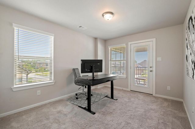 9715 Migrant Hawker Court, Conroe, TX 77385