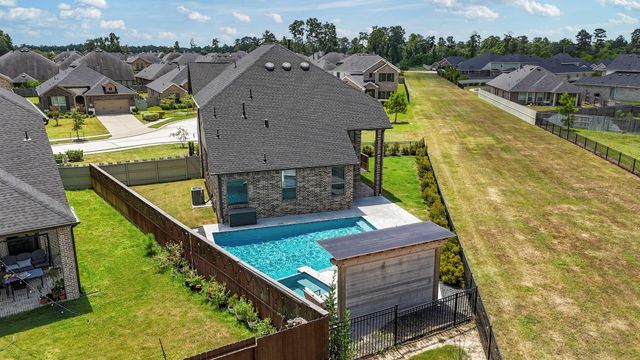 9715 Migrant Hawker Court, Conroe, TX 77385
