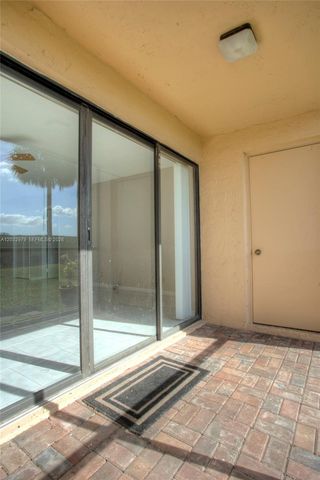 300 Racquet Club Rd 104, Weston, FL 33326