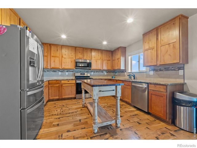 1110 Coyote Lane, Wiggins, CO 80654